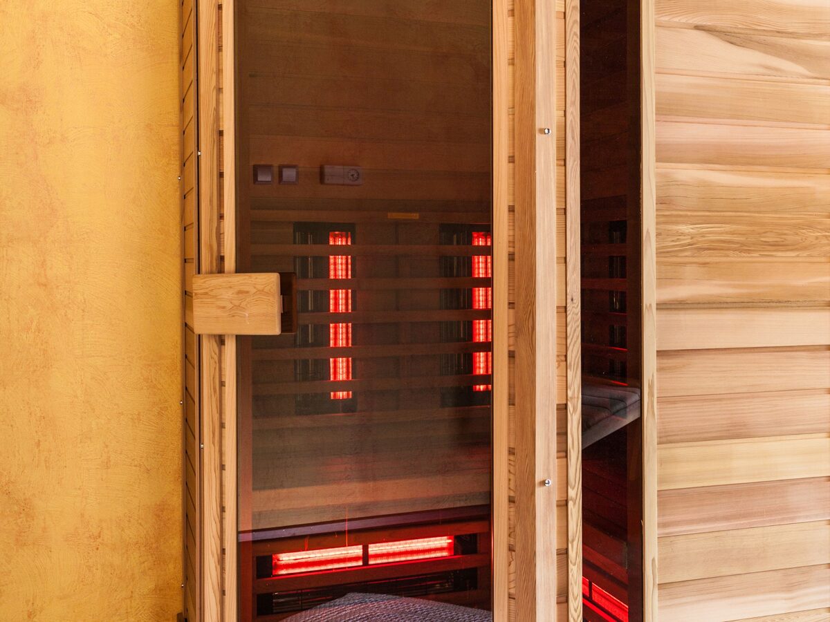 timber infrared sauna with rising steam